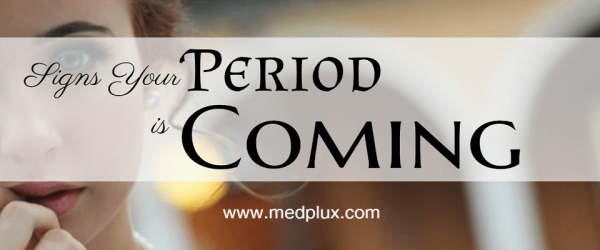 symptoms and signs of period coming