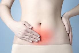 fertilization symptoms abdominal pain