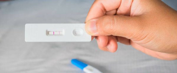pregnancy test brown discharge